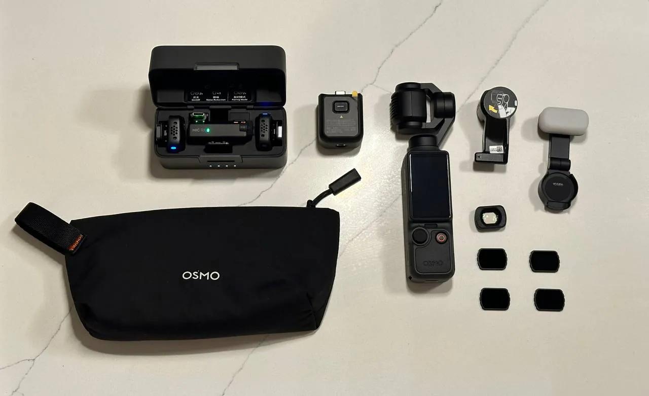 DJI Osmo Pocket 4 с микрофоном и объективом