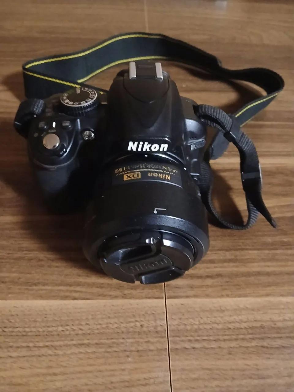 Фотоаппарат Nikon D3100 с объективом