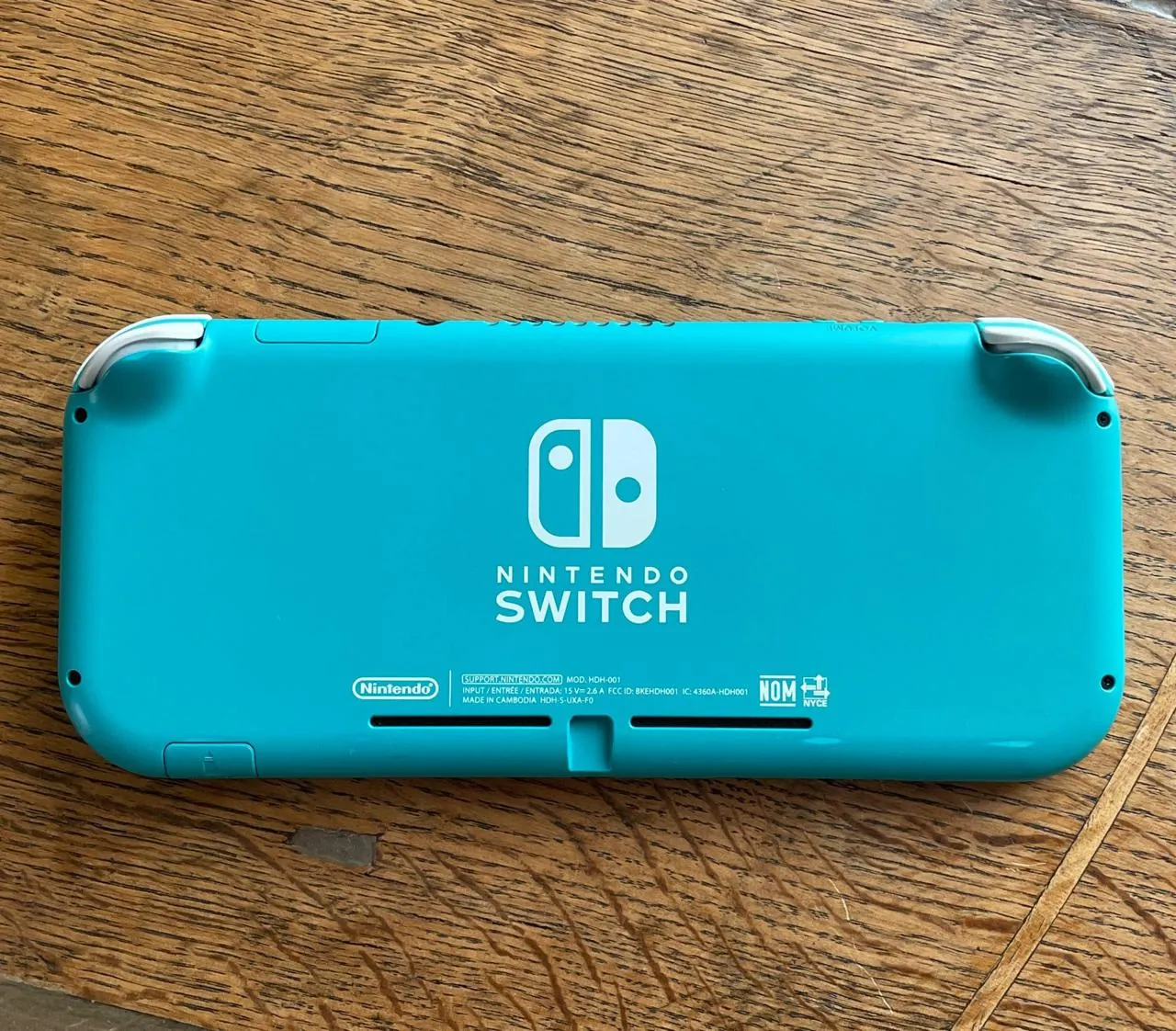 Nintendo Switch Lite бирюзовый с защитным стеклом 2