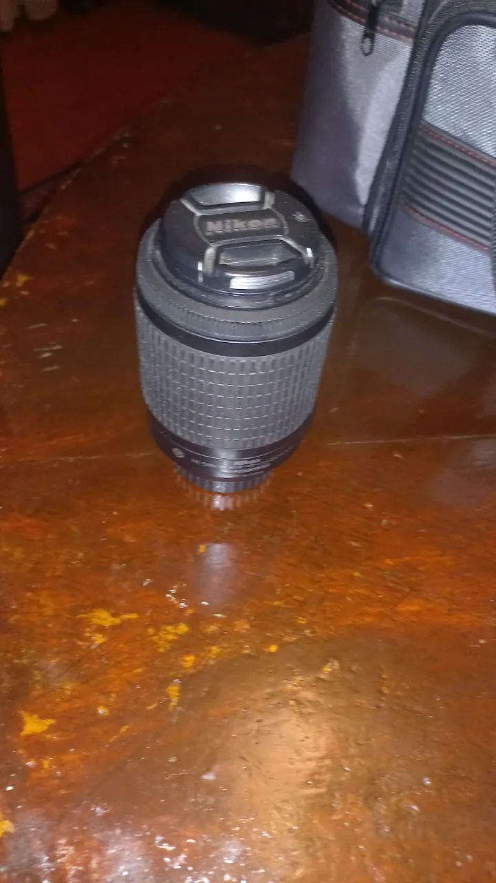 Объективы Nikon 55-200мм, 18-55мм и 60мм 5