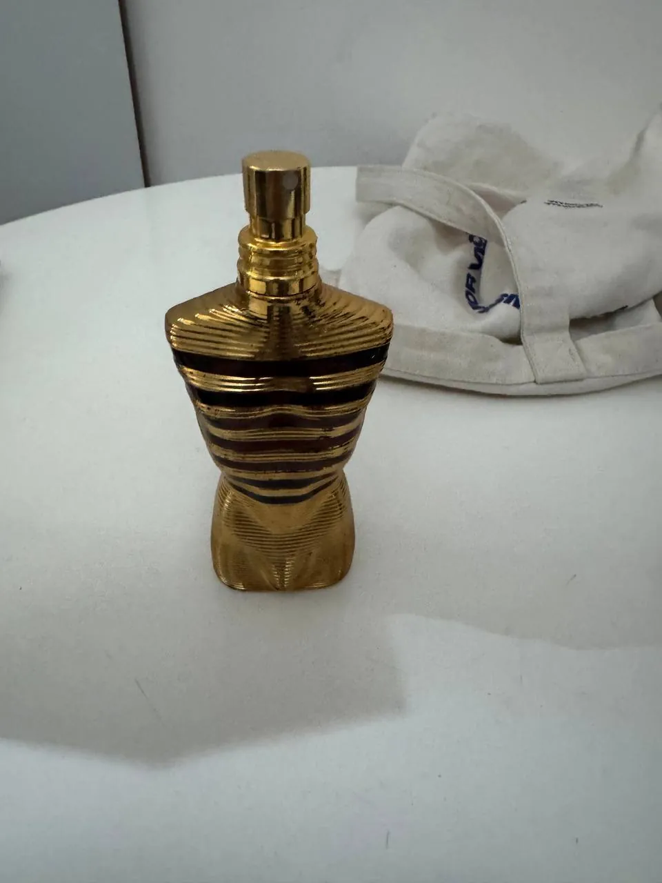 Духи Jean Paul Gaultier, Hugo Boss и кроссовки Nike 1