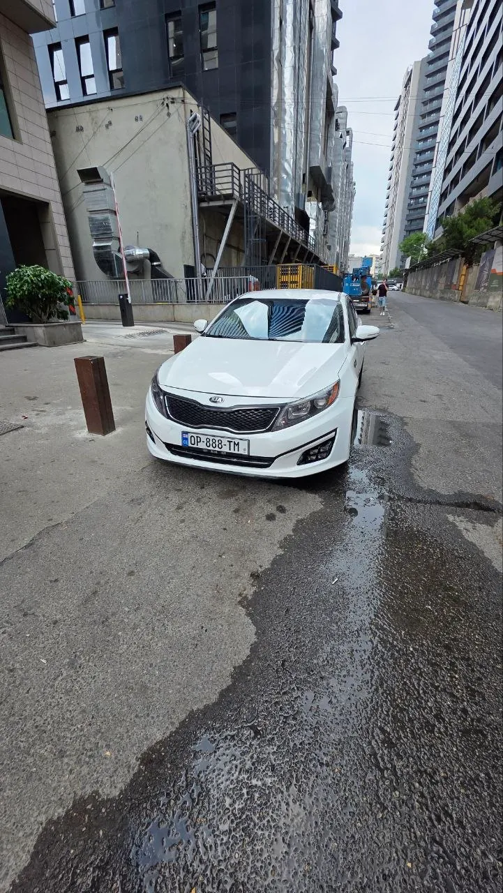 Kia Optima Hybrid 2016 белый жемчуг 1