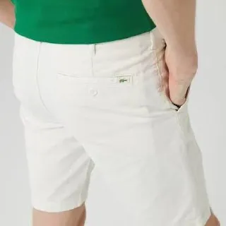 Шорты Lacoste и кроссовки New Balance 3
